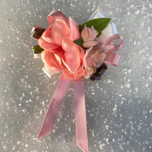 Spilla bouquet rosa per abiti da cerimonia bambina